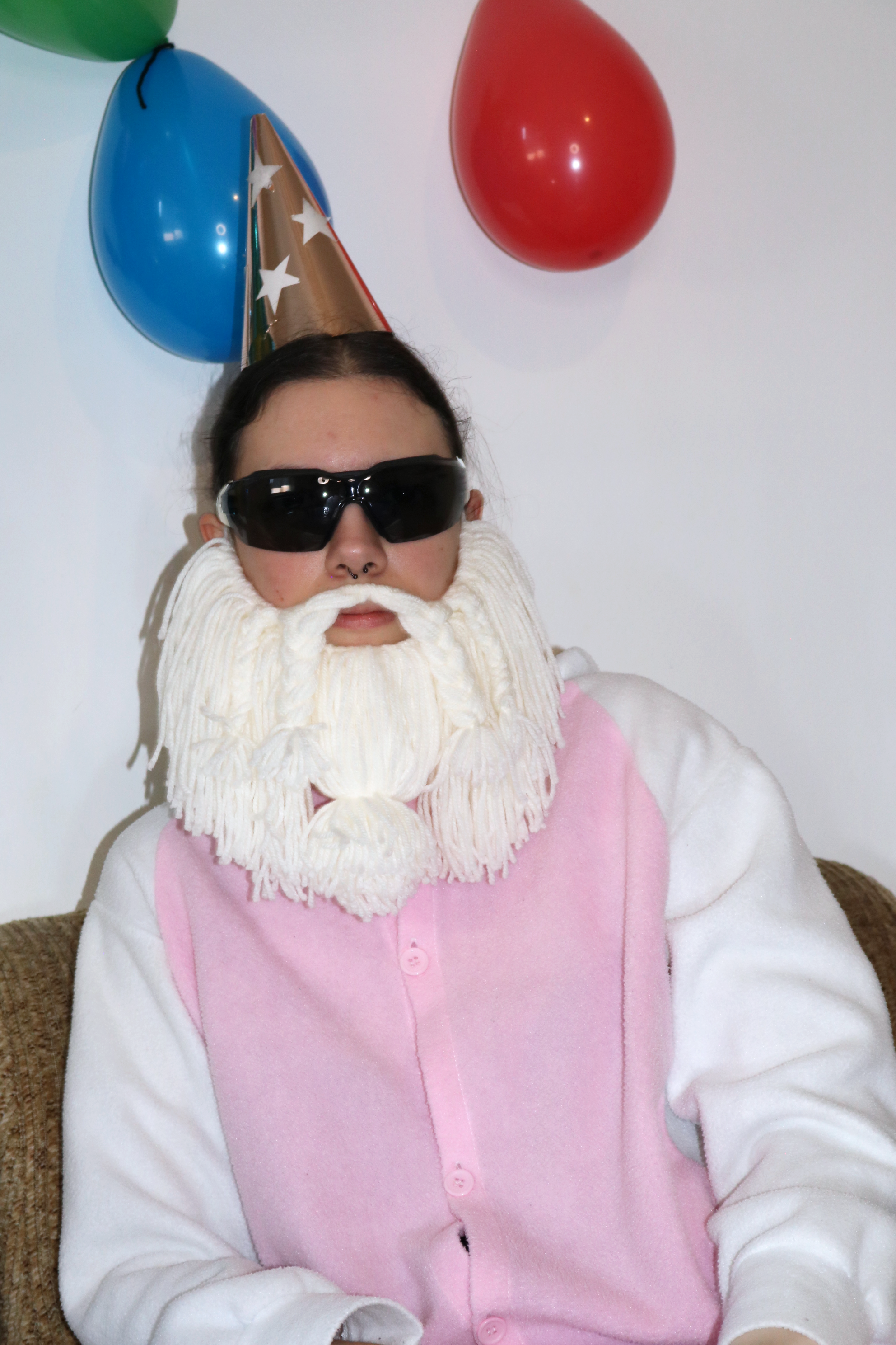 Picture of the Crafting Wizard looking cool, with balloons in the background.
