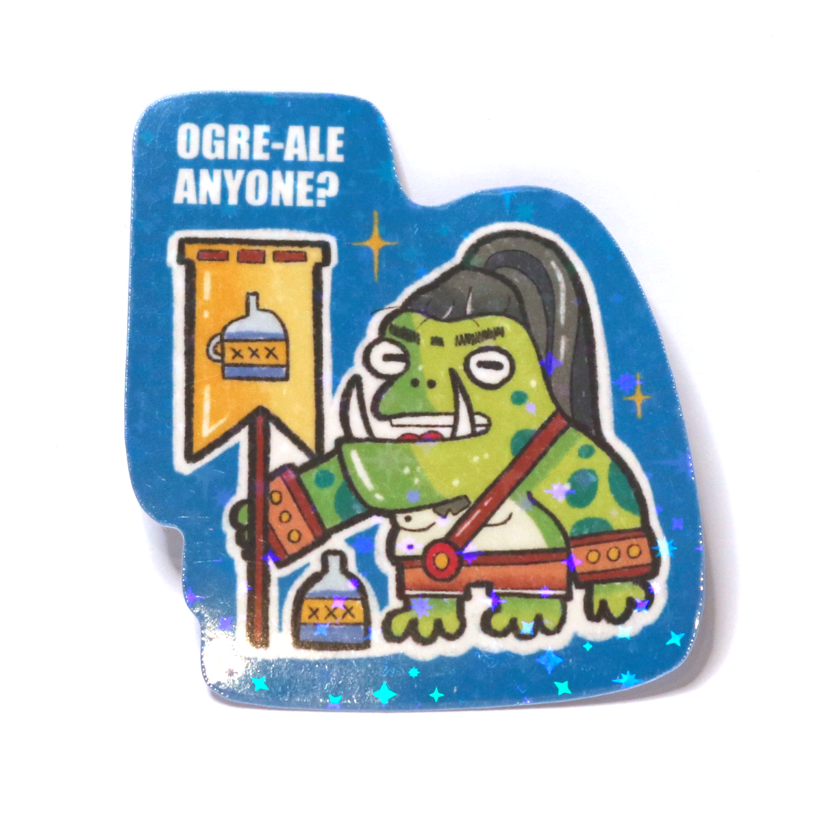 Sticker of a drunk ogre frog with a ponytail holding a battle flag with a bottle, standing beside a bottle, with the slogan ‘Ogre-Ale Anyone?’
