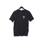 Front of the black Kawaii Bear T-shirt on a hanger, with a small paw print