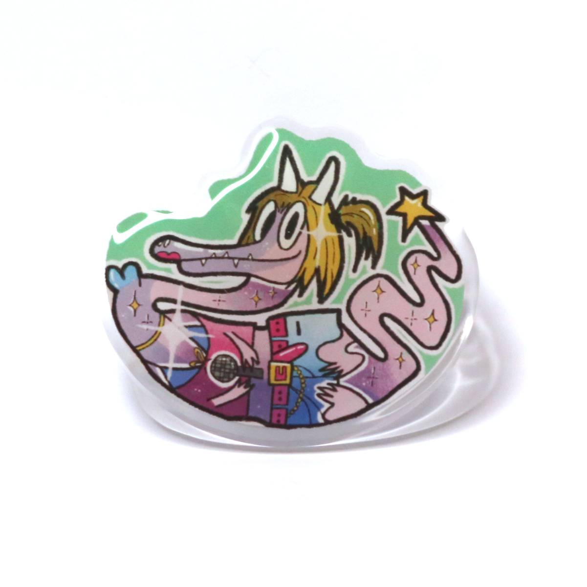 Acrylic pin of a Y2K-style dragon with blonde bob hair, holding a microphone, wearing trendy Y2K fashion, with a star at the tip of its tail.