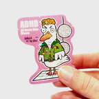 Video: Sticker of an angry duck in an 80s disco outfit on a dance floor with disco balls, with the slogan ‘ADHD – All Ducks Hate Discos.’