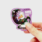 Video: Sticker of a confused duck in an anime-style school outfit surrounded by a dark demon, with the slogan ‘ADHD – All Ducks Have Demons.’